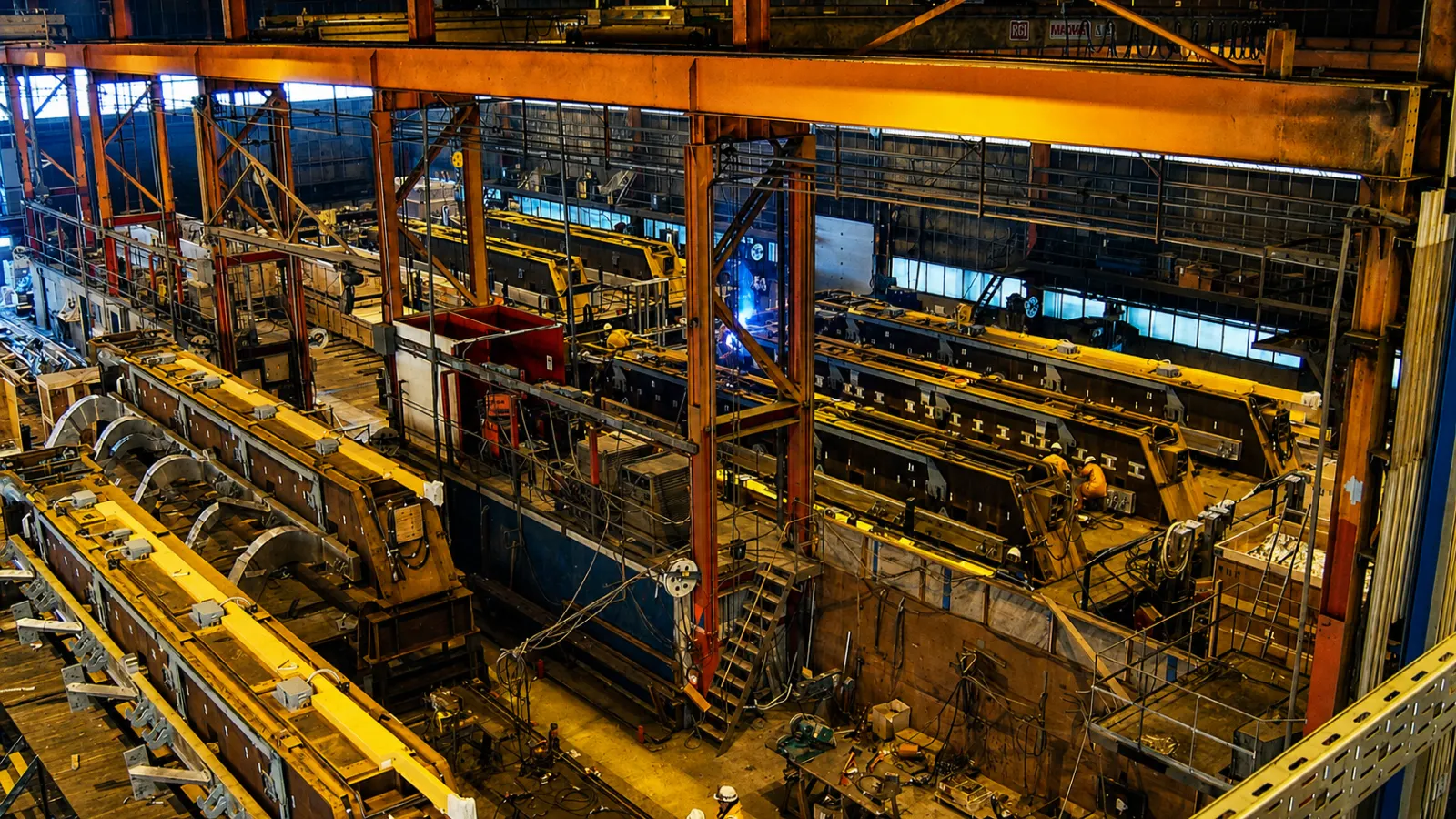 Anode superstructure sections under fabrication in the workshop hall
