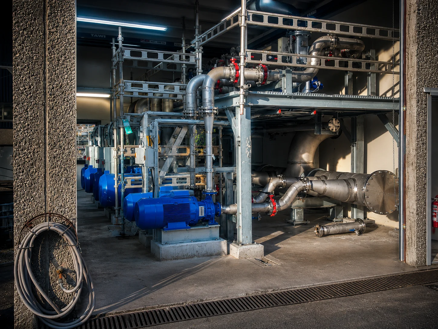 Pumps, mechanical systems and process piping in a plant room