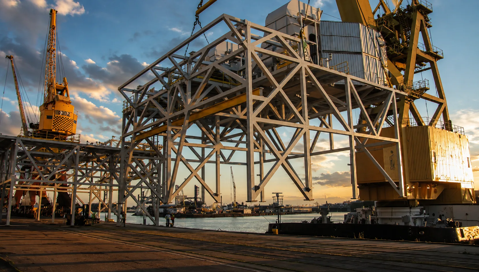 Offshore structure module under crane at fabrication quay